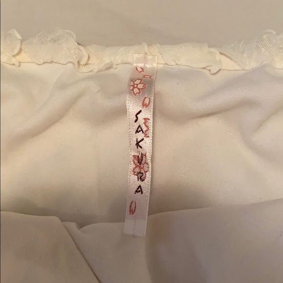 Sleeveless and strapless dress - Picture 2 of 4